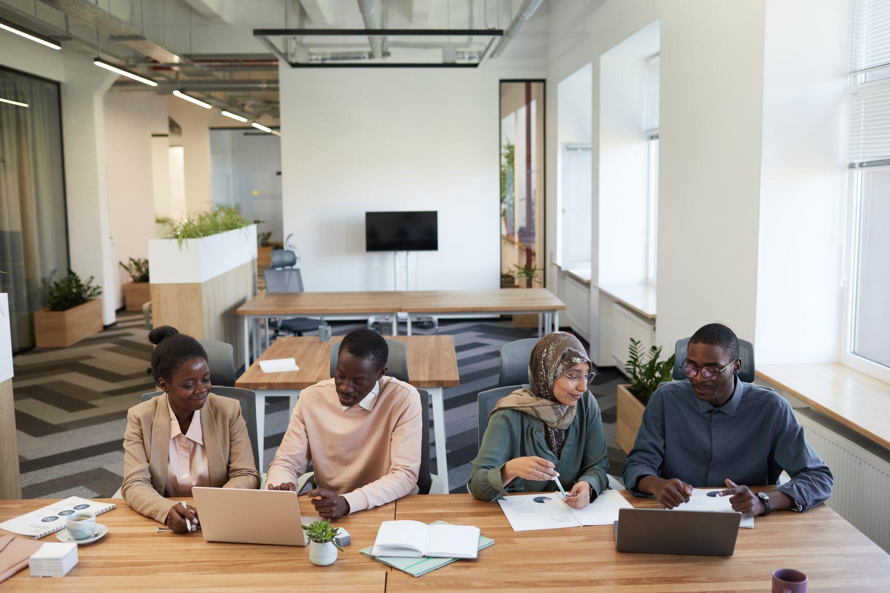 A team working together in a modern open-plan office